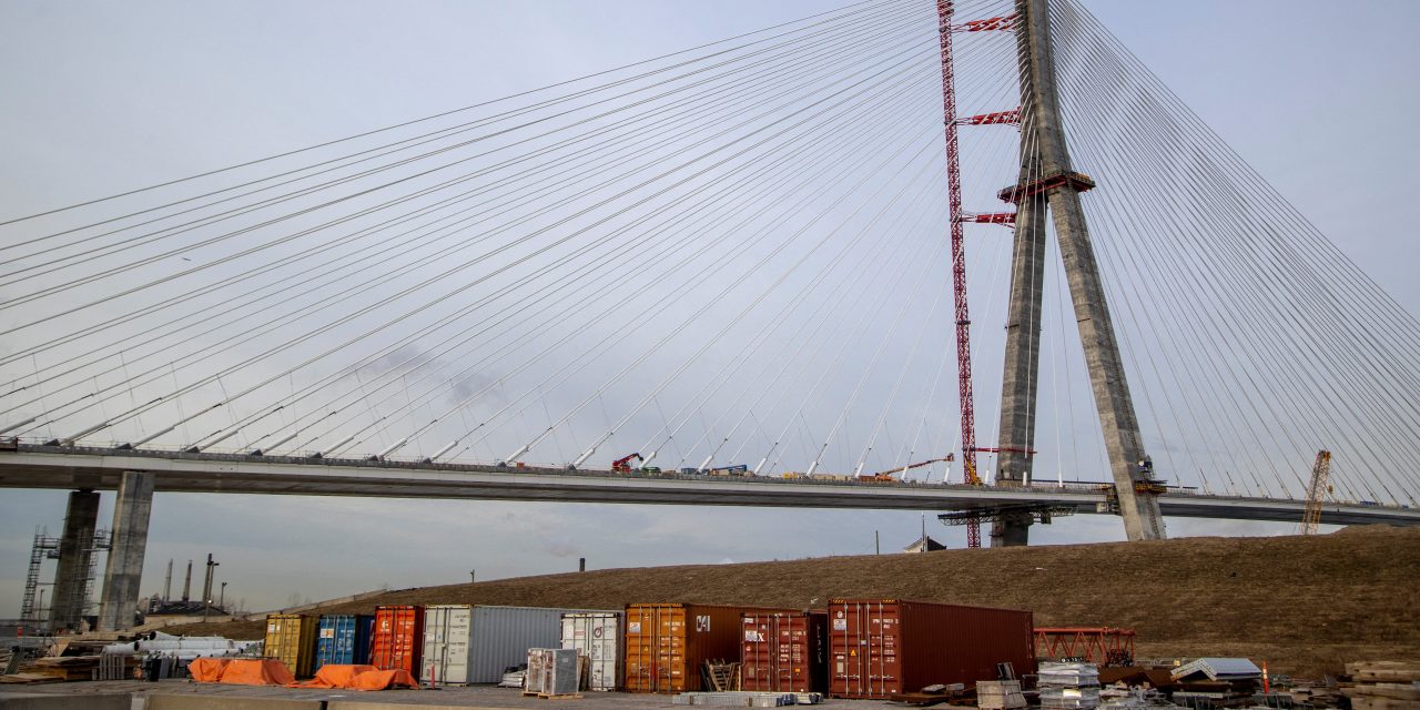 Aerial view of a cable-stayed bridge spanning a river